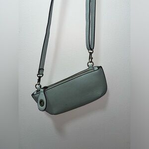 Light blue purse with adjustable strap